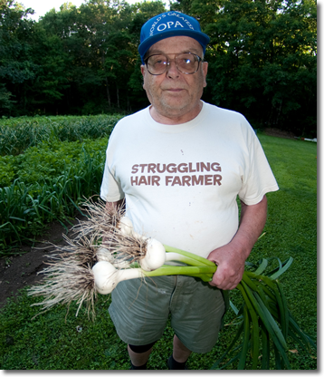 Farmer Johan with Garlic Bulbs